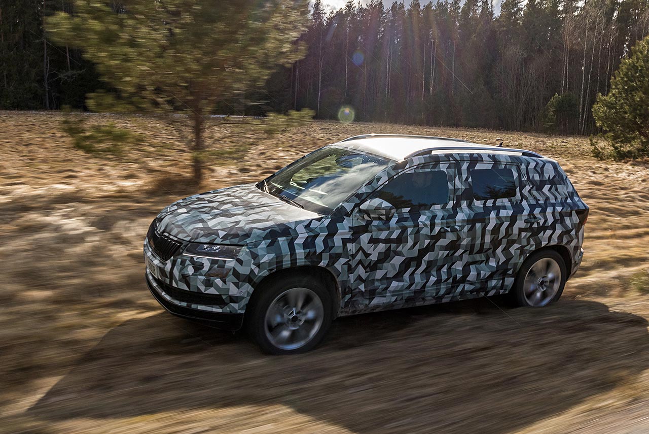 2017 skoda karoq suv camouflagued side motion