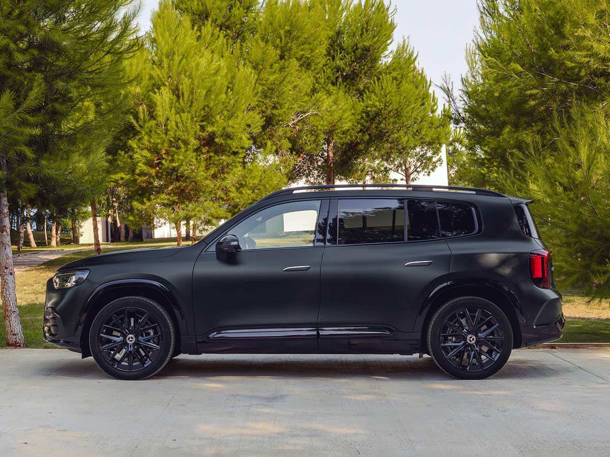 All new 2026 electric Mercedes Benz GLB MANUFAKTUR cosmos black magno Side