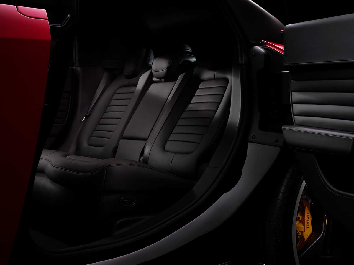 Inside Ferrari’s Revolutionary 1050 HP Electric Supercar That Changes Everything 24 2026 Ferrari Luce Black Interior Rear Seats Door Open