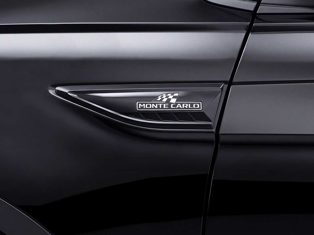New Skoda Slavia 2026: Features, Engine Options, Variants, Safety and Everything You Need to Know 33 2026 Skoda Slavia Monte Carlo Badge