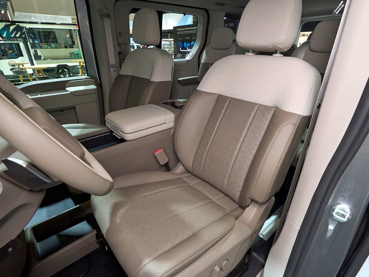 Kia PV7 Unveiled: Specs, Range, 800V Charging, and Payload Capabilities of Kia’s Heavy-Duty Electric PBV 24 2027 Kia PV7 Passenger Driver Seat